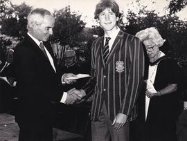 1975 Annual Prize Giving with Mr Slaven and Mrs Trudy Elliott and unknown prize winner