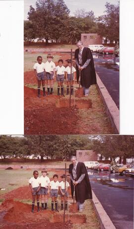 1983 Headmaster Mr Frielick planting trees on the Prep playing field